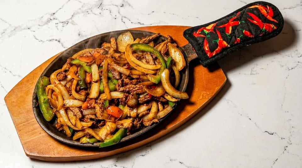 Chicken or Steak Fajitas.